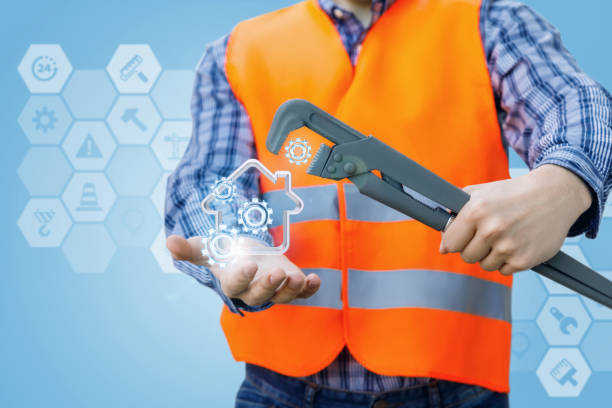 istock Repairman repairs the house. 944330130