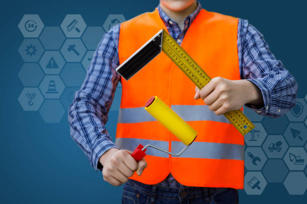 istock Roller and angle in the hands of the Builder. 944330188