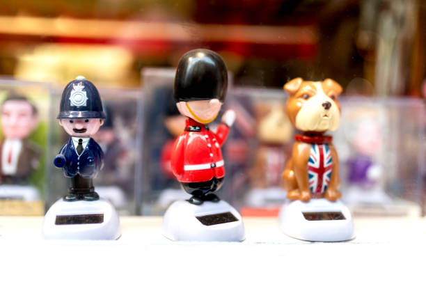 A London souvenir shop displaying cartoon British souvenirs including a British bobby or policeman, a Queens guard and a British bulldog wearing a Union Jack coat in the UK A London souvenir shop displaying cartoon British souvenirs including a British bobby or policeman, a Queens guard and a British bulldog wearing a Union Jack coat in the UK London Memorabilia stock pictures, royalty-free photos & images