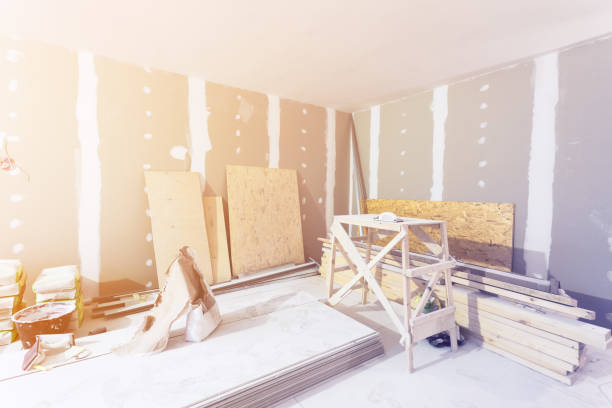 istock Materials for construction - putty packs, sheets of plasterboard or drywall- in apartment is under construction, remodeling, renovation, extension, restoration and reconstruction. 944348434