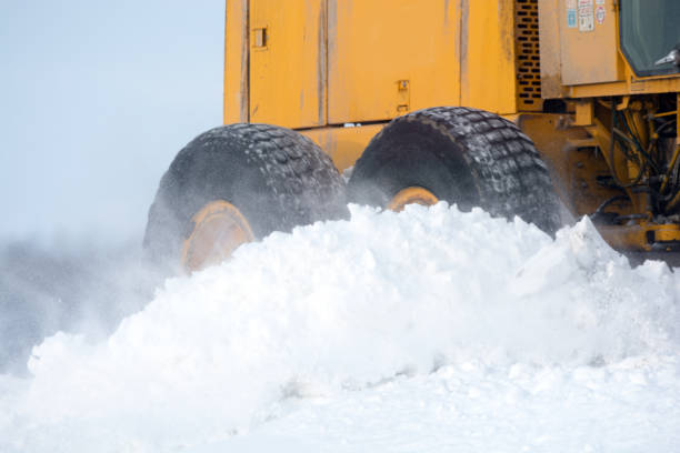 istock Close-up of a road grader removing snow 944348906