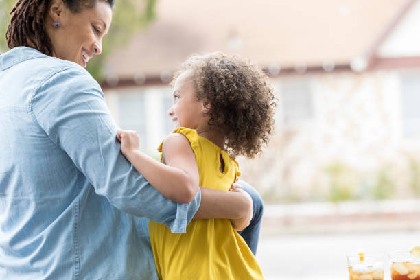 istock Mother and daughter enjoy time outside together 944351514