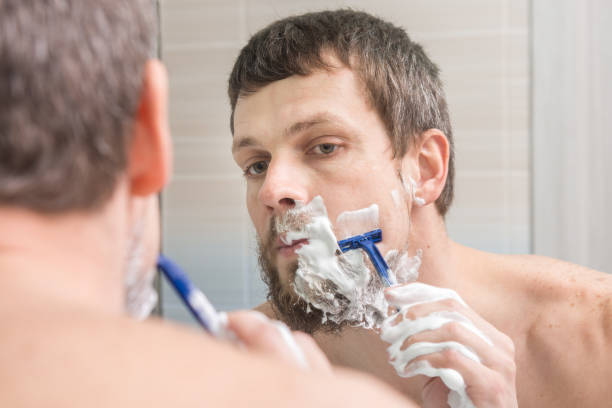 istock The man decided to change the image and completely shaves 944352016