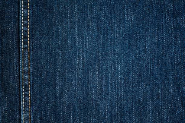 Blue Jeans Cloth With Seam. Background Texture