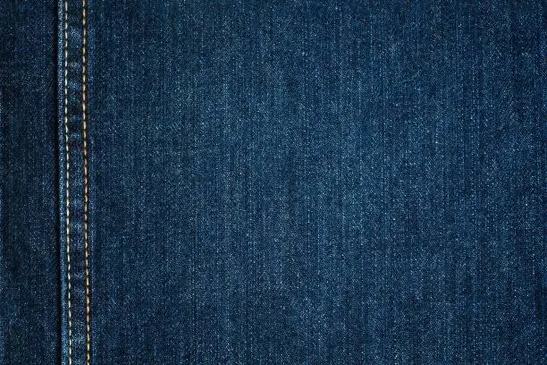 Blue Jeans Cloth With Seam. Background Texture.