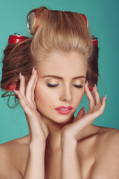 istock funny blond woman over blue background 944355976