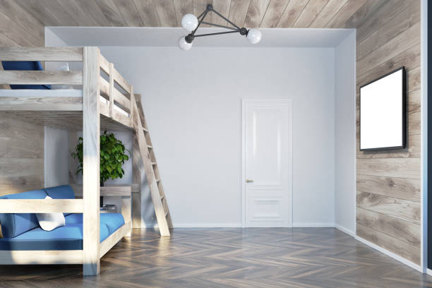 istock Loft bed and a blue sofa interior poster side view 944364900