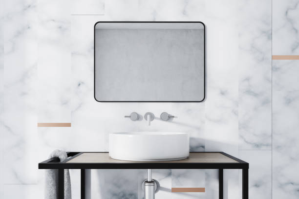 istock White marble bathroom sink close up 944365092