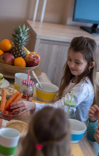 istock Young girl and breakfast 944372830