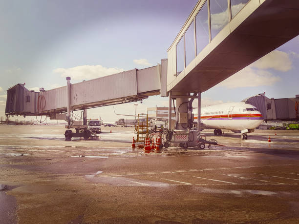 Long pull-out gangway from gate to plane at the airport