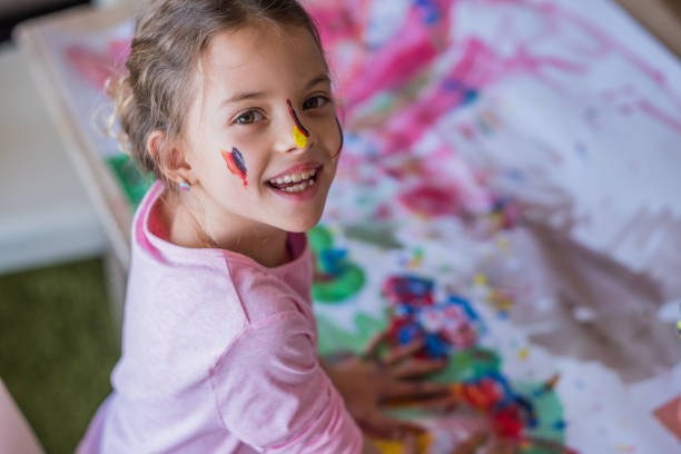istock Girl with painted face 944373404