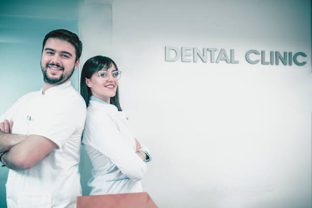 Dental Team Posing in their New Clinic
