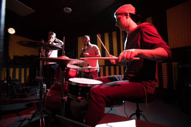 istock Band Playing Music in Recording  Studio 944390230