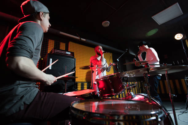 istock Band Recording Music in Studio 944390296