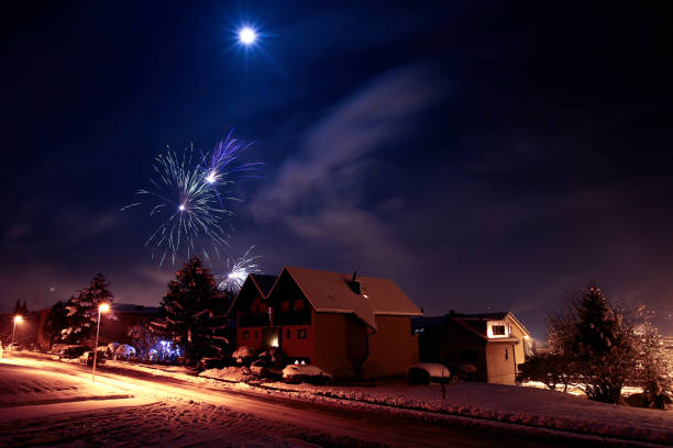 Fireworks on a moonlit night. Location: Liechtenstein