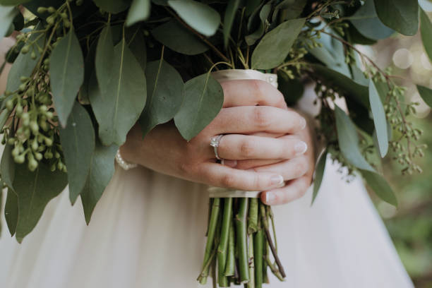 istock Bride Holding Bouquet on Wedding Day 944398434