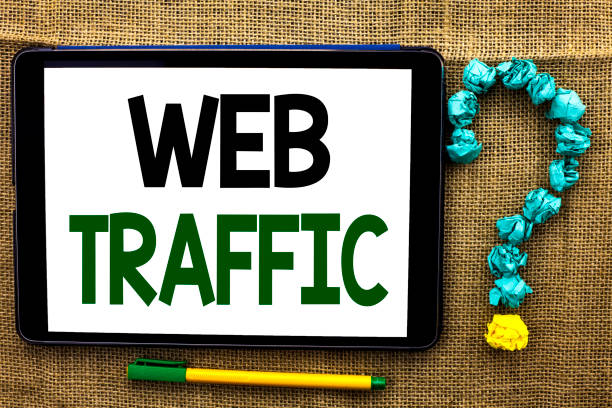 istock Conceptual hand writing showing Web Traffic. Business photo text Internet Boost Visitors Audience Visits Customers Viewers written on Tablet on the jute background Pen next to it Ask for. 944398436