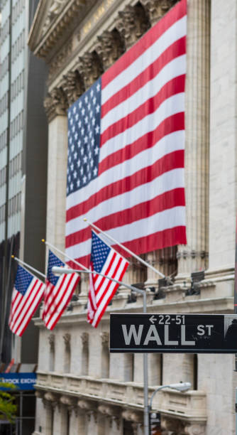 istock Wall St, sign financial district New York, USA 944404772