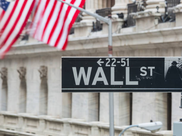 istock Wall St, sign financial district New York, USA horizontal 944404790