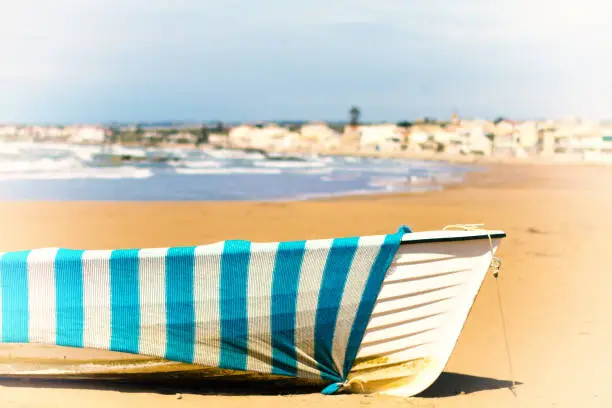 Photo of Donnalucata (Ragusa), Sicily: Wrapped Rowboat on Beach