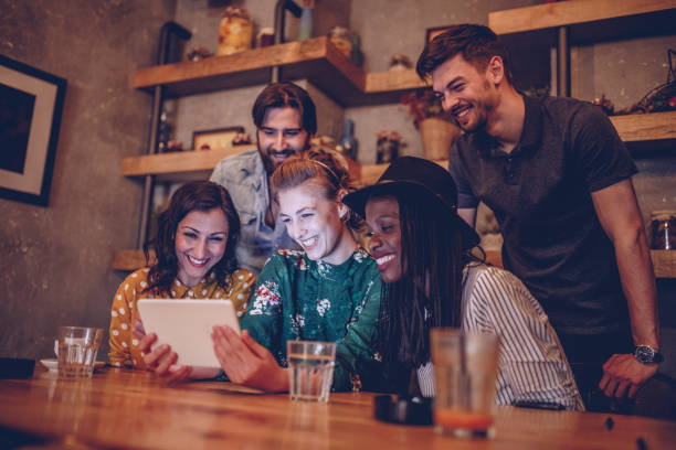 istock Young friends at coffee shop 944406518