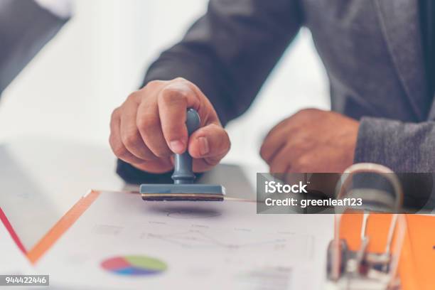 Business Stamping Rubber Stamp On A Documents Business Concept Stock Photo - Download Image Now