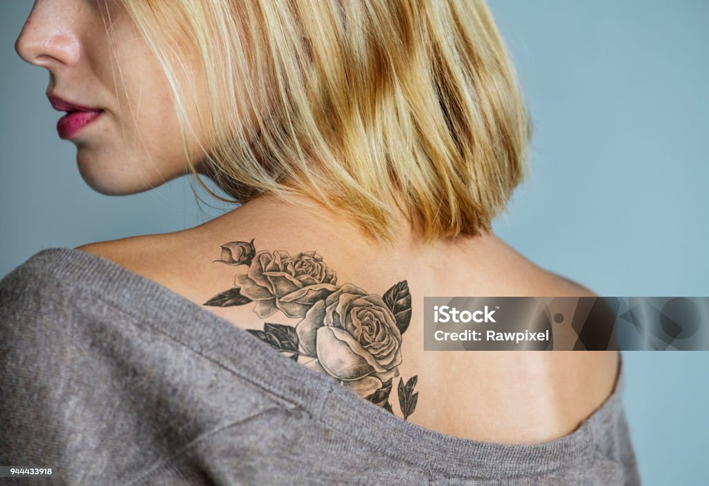 Back tattoo of a woman Back tattoo of a woman

***These are our own 3D generic designs. They do not infringe on any copyrighted designs.*** Tattoo Stock Photo