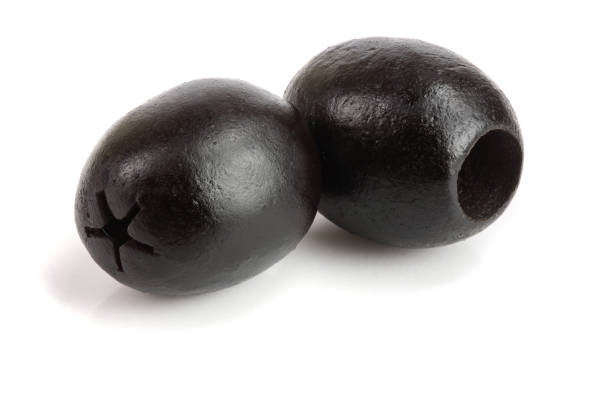 istock whole black olives isolated on white background macro 944444934