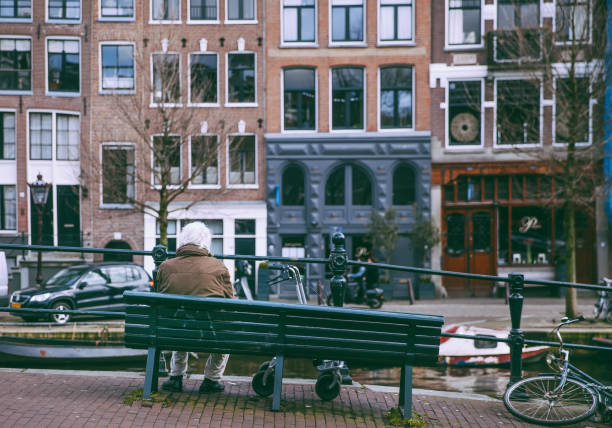 Amsterdam,Netherlands, March 22nd 2018: Canal houses in Amsterdam during day time ,Netherlands.