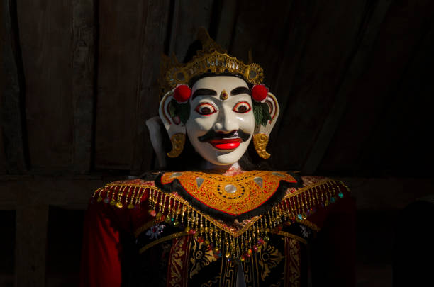 traditional balinese mask on a black background. - bali sculpture balinese culture human face imagens e fotografias de stock