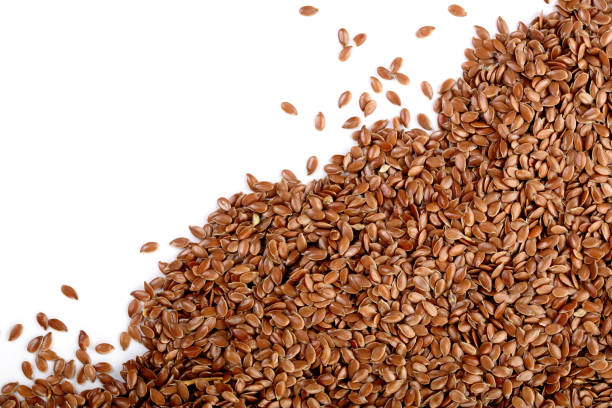 istock flax seeds isolated on white background with copy space for your text. Top view 944461306