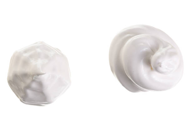 istock whipped cream or meringue isolated on white background. Top view. Flat lay 944461384