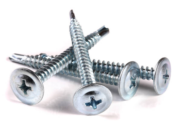 istock metal screws isolated on white background closeup 944461498