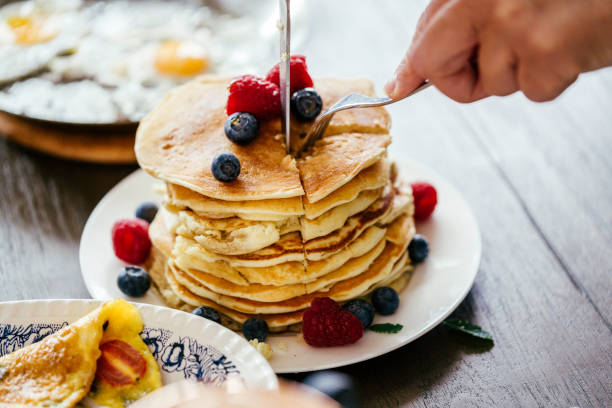 istock Stack of Pancakes with Maple Syrup and Fresh Berries 944461944