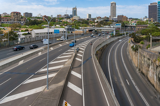 Sydney, Australia - September 23, 2017: M1, Eastern Distributor highway with Sydney CBD skyline on the background view from above