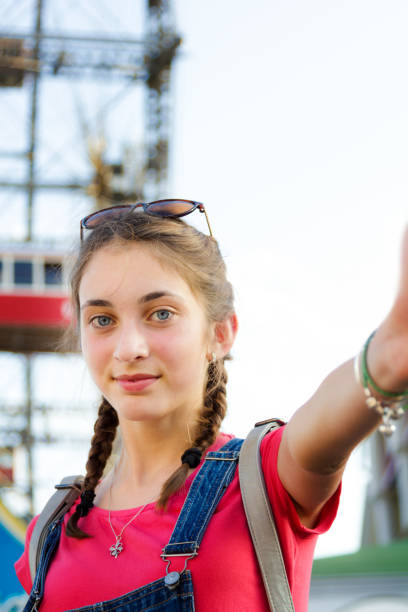istock Happy girl smiling to the camera. 944471470