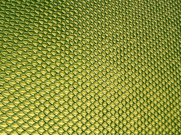 istock Yellow green Golden Scales textured material or background 944475082
