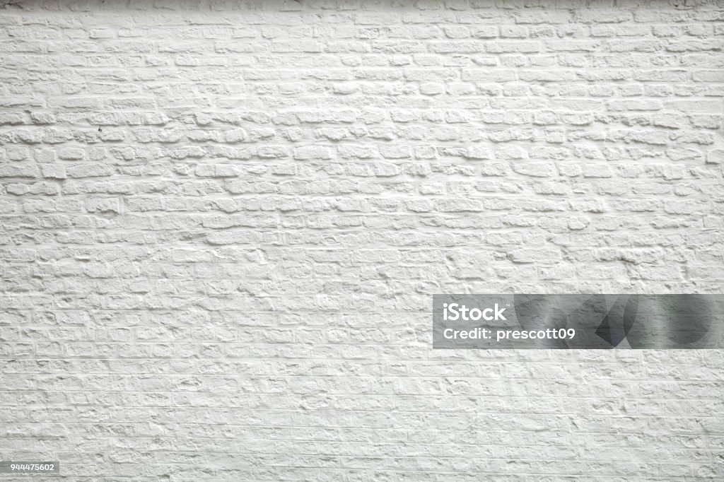 Old white wall background Texture of old dark white blocks, brick wall background. Wall - Building Feature Stock Photo