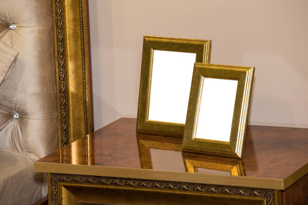 istock Chest of drawers with two blank photo frames 944478078