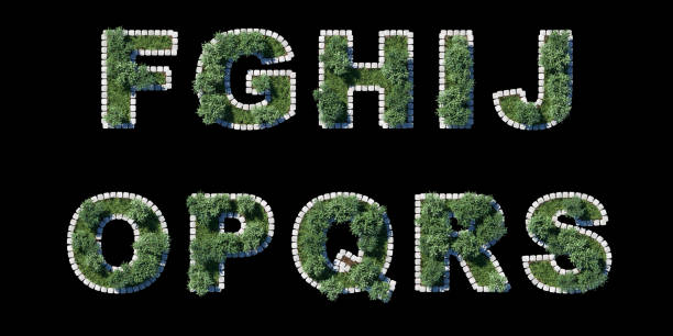istock trees and grass font with grey cubing border on black. letters collection 944478392