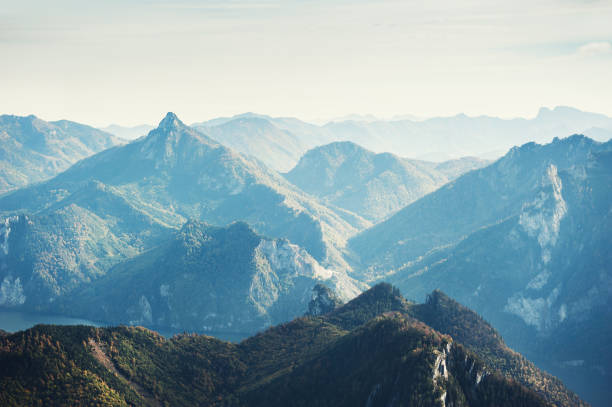 istock Mountain peaks in foggy morning. 944478872