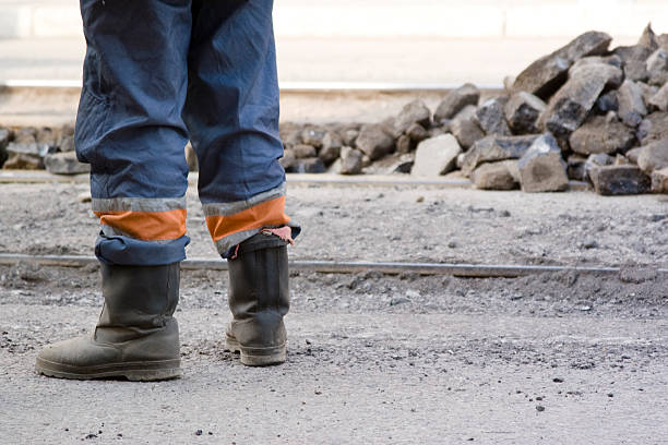 Worker Leg 90+ Roadworker Stock Photos, Pictures & Royalty-Free Images - iStock