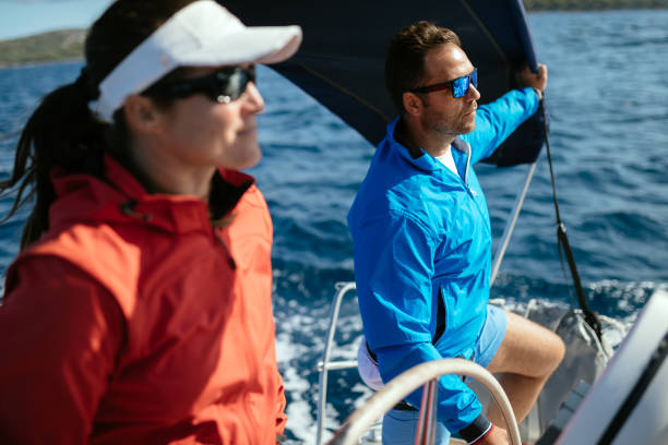 istock Attractive strong woman sailing with her boat 944496434