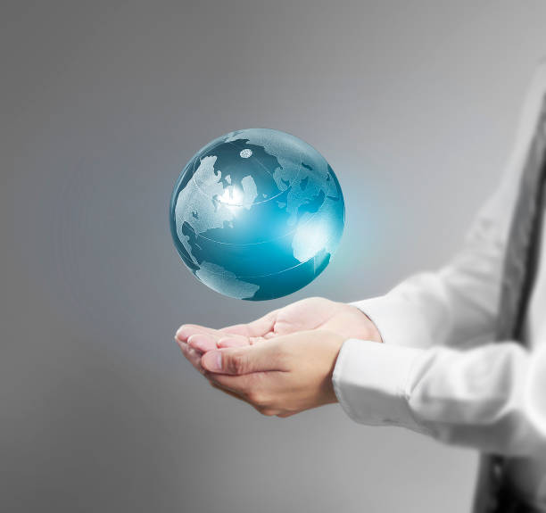 istock lobe ,earth in human hand, Earth image provided by Nasa 944498110
