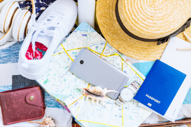 istock travel concept. map stuff biometric passport. overhead view 944499296