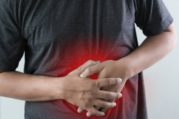 istock man stomach suffering and having a stomachache 944501092
