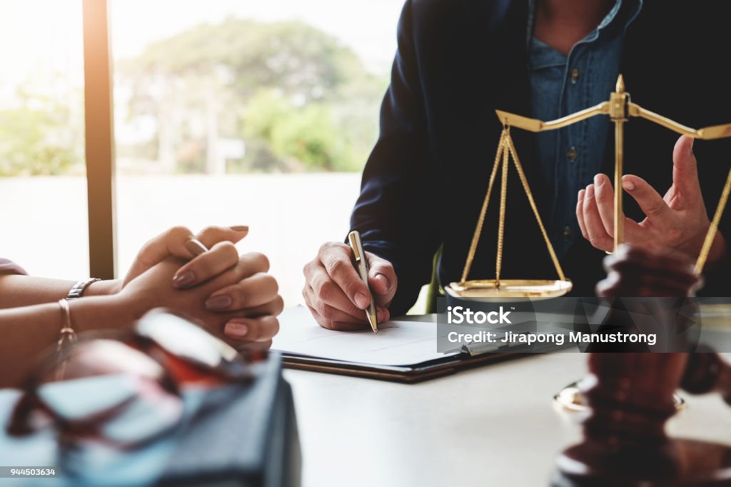 Law should know concept, The lawyer explained to the client to plan the case in court. Lawyer Stock Photo