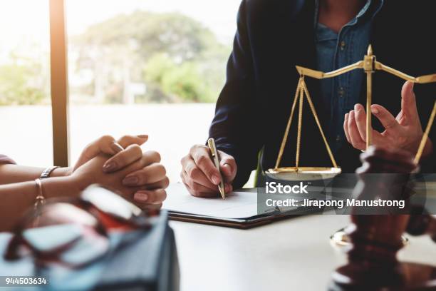 Law Should Know Concept The Lawyer Explained To The Client To Plan The Case In Court Stock Photo - Download Image Now