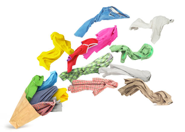 istock Clothes flying out of the package isolated on white background 944518722