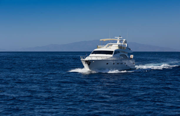 istock Boat in deep blue water, Santorini, Greece 944524020